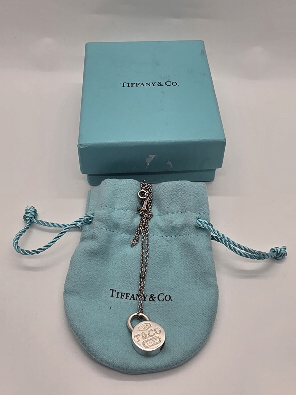 Tiffany & Co. Silver Padlock Pendant Necklace with Signature Blue Pouch